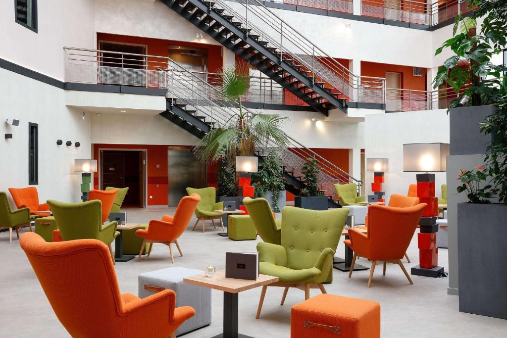 Posezení v ubytování Best Western Plus Hôtel Escapade Senlis