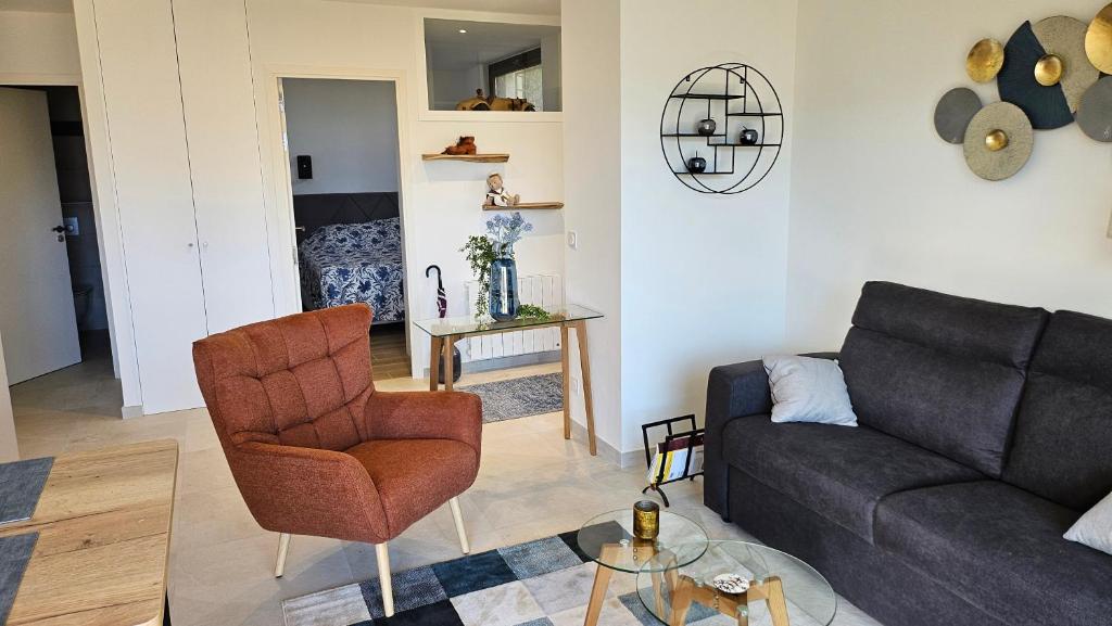 Posezení v ubytování Le Cosy - joliment aménagé - vue magnifique