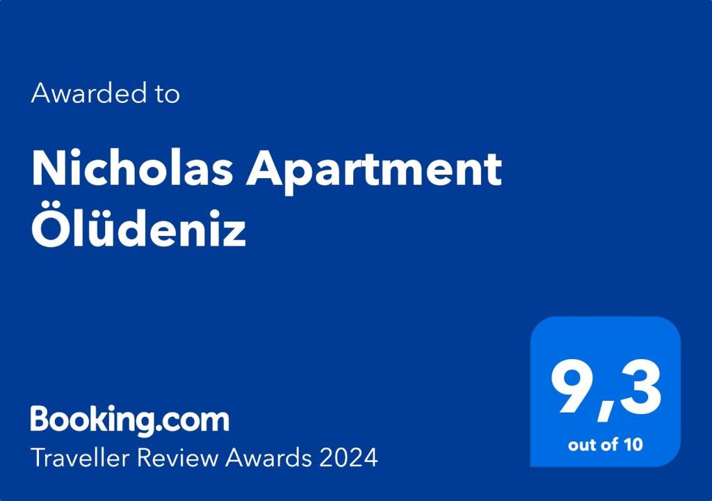 een blauwe rechthoek met de woorden nicholas afspraak en eldritch bij Nicholas Apartment Ölüdeniz in Fethiye