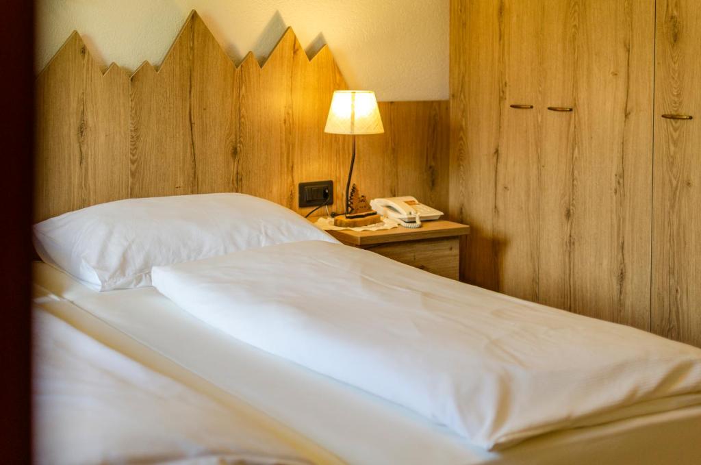 Postel nebo postele na pokoji v ubytování Kyrr Smart Mountain Retreat