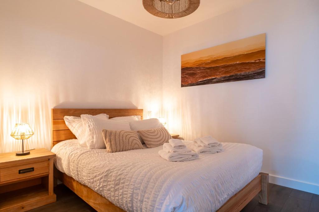 Cama ou camas em um quarto em La Proue - Charmant appt vue mer