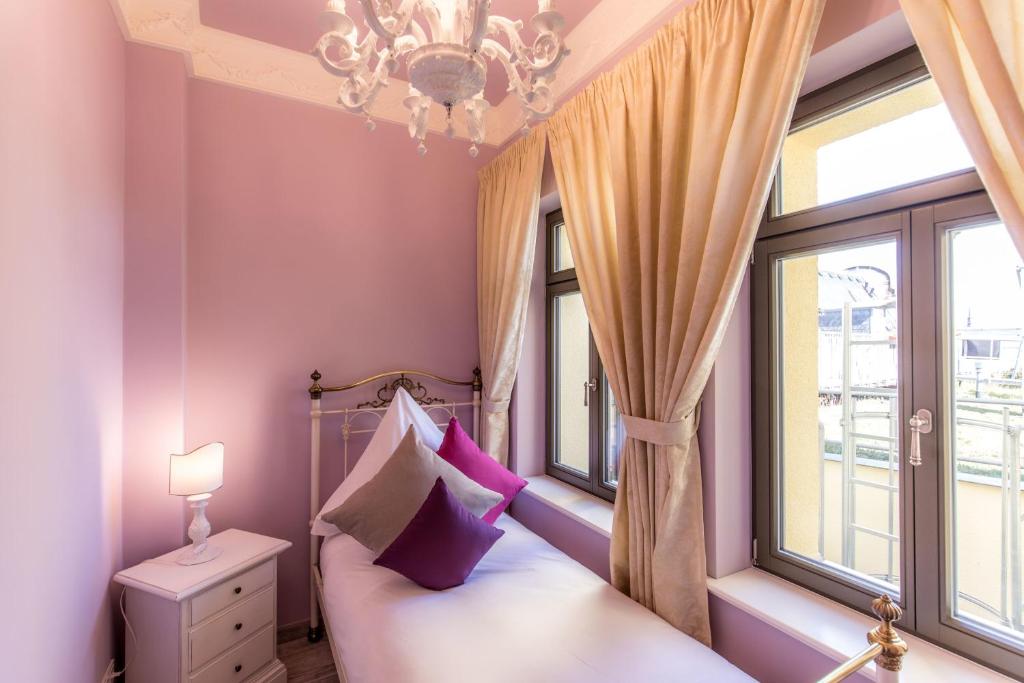 Voodi või voodid majutusasutuse Grande Albergo Giancarlo toas