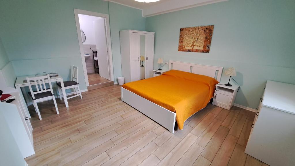 Postel nebo postele na pokoji v ubytování Altomuro 39 di S.A.