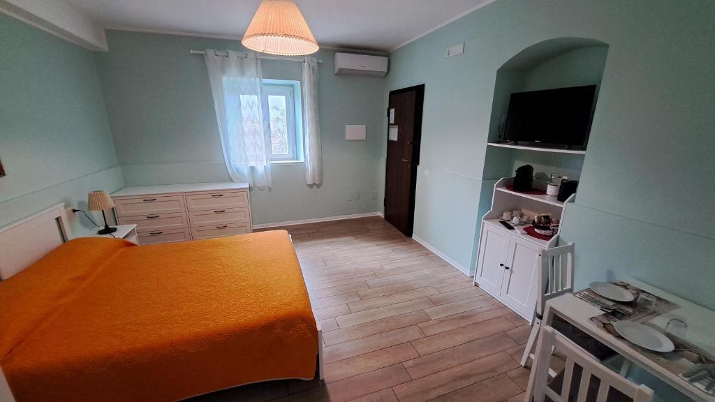 Postel nebo postele na pokoji v ubytování Altomuro 39 di S.A.