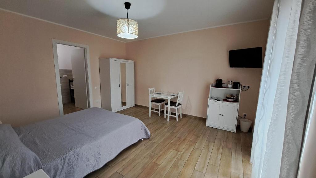 Postel nebo postele na pokoji v ubytování Altomuro 39 di S.A.