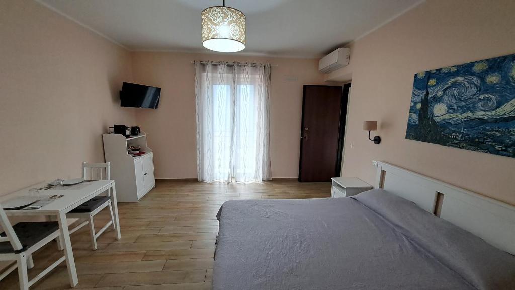 Postel nebo postele na pokoji v ubytování Altomuro 39 di S.A.