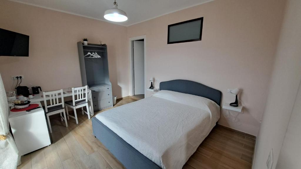 Postel nebo postele na pokoji v ubytování Altomuro 39 di S.A.