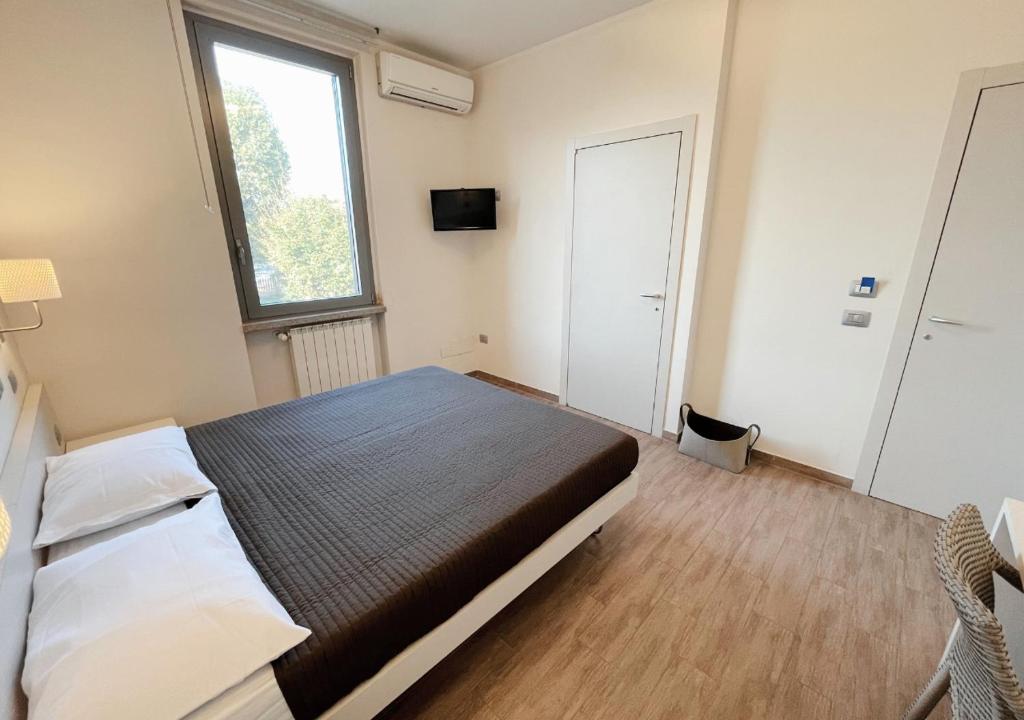 Postel nebo postele na pokoji v ubytování Belso