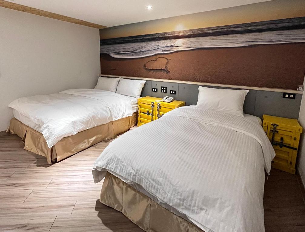 Postel nebo postele na pokoji v ubytování Good Time Boutique Hotel