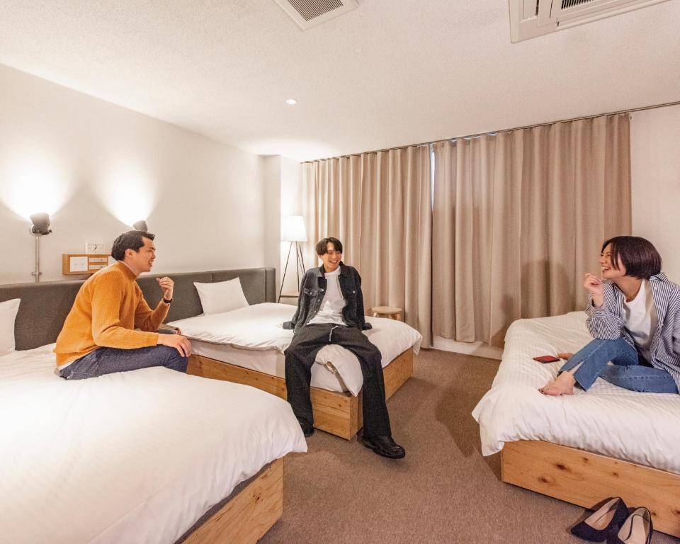 ホテルリリーフ小倉Annexにあるベッド