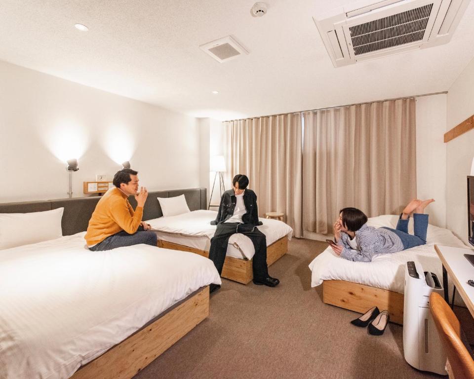 ホテルリリーフ小倉Annexにあるベッド
