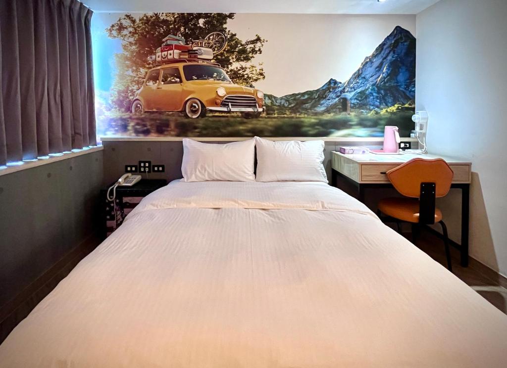 Postel nebo postele na pokoji v ubytování Good Time Boutique Hotel