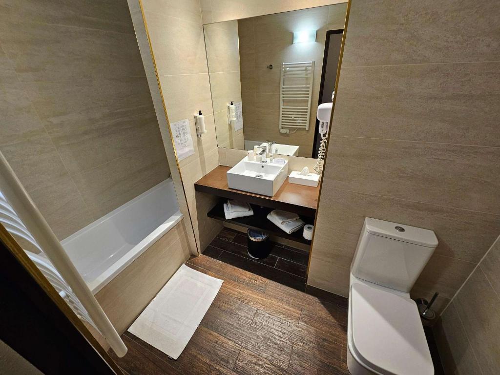 Koupelna v ubytování Best Western Terre de Provence