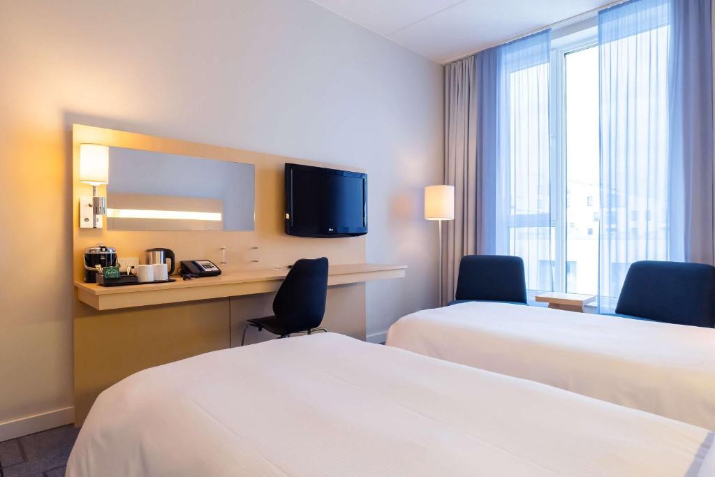 Postel nebo postele na pokoji v ubytování Best Western Plus Park City Malmö