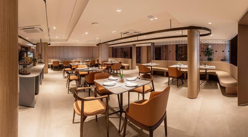 Um restaurante ou outro lugar para comer em HCM - Hotel Corais de Manaira