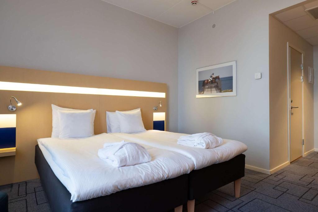 Postel nebo postele na pokoji v ubytování Best Western Plus Park City Malmö