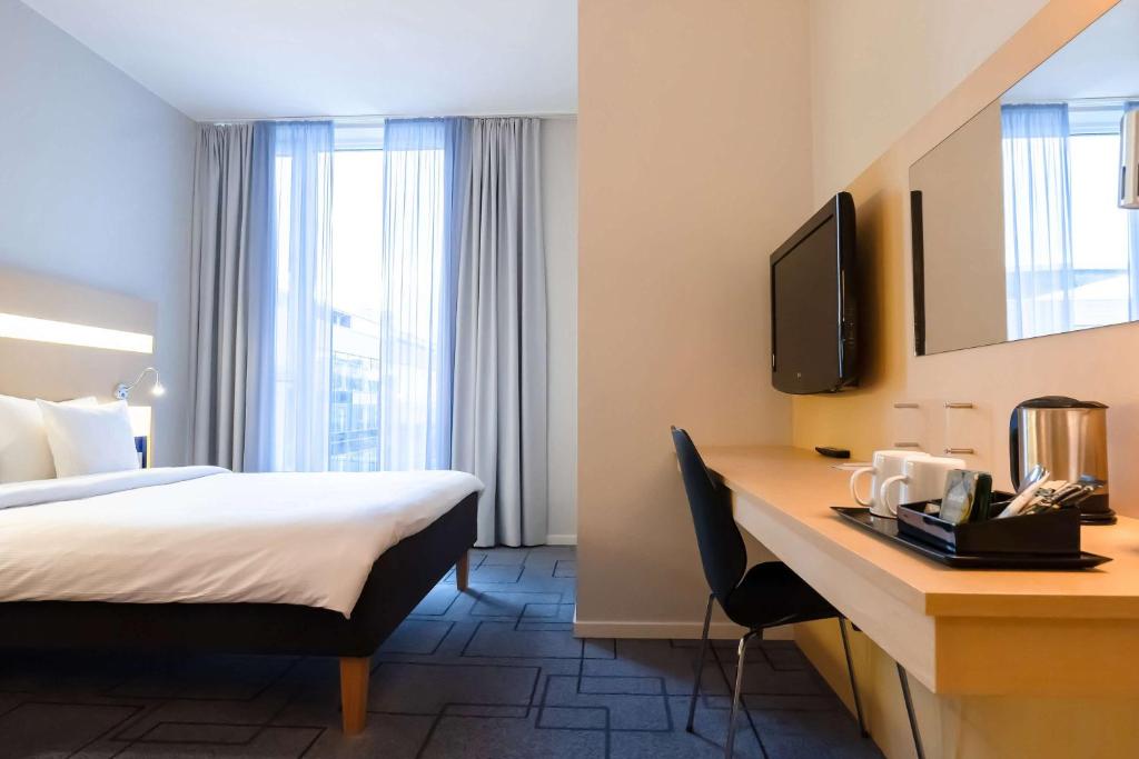Postel nebo postele na pokoji v ubytování Best Western Plus Park City Malmö