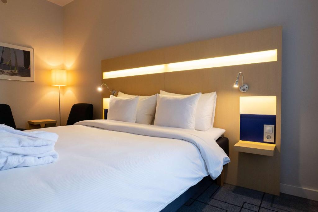 Postel nebo postele na pokoji v ubytování Best Western Plus Park City Malmö