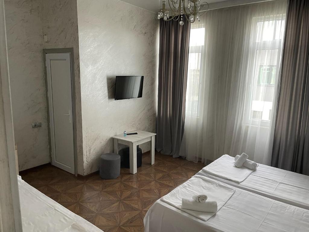 Postel nebo postele na pokoji v ubytování Emilia