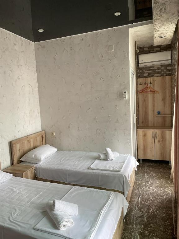 Postel nebo postele na pokoji v ubytování Emilia