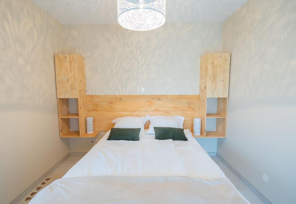 Postel nebo postele na pokoji v ubytování gîte fleur côte d'opale - Ambleteuse