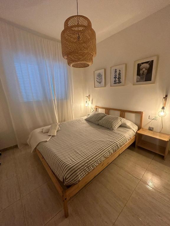 Postel nebo postele na pokoji v ubytování APARTAMENTO PEÑISCOLA