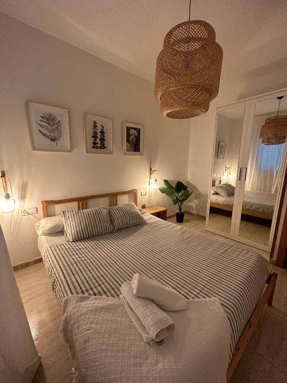 Postel nebo postele na pokoji v ubytování APARTAMENTO PEÑISCOLA