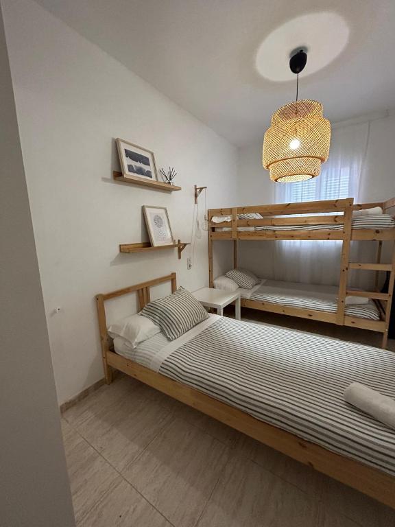 Postel nebo postele na pokoji v ubytování APARTAMENTO PEÑISCOLA