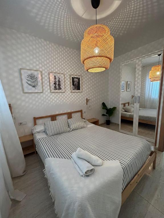 Postel nebo postele na pokoji v ubytování APARTAMENTO PEÑISCOLA