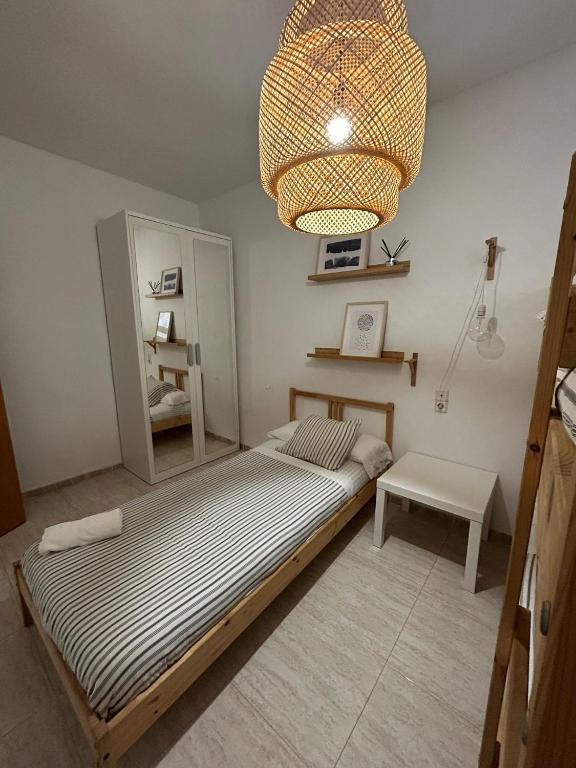 Postel nebo postele na pokoji v ubytování APARTAMENTO PEÑISCOLA