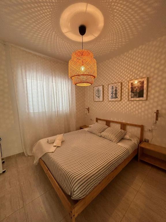 Postel nebo postele na pokoji v ubytování APARTAMENTO PEÑISCOLA