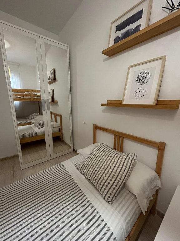 Postel nebo postele na pokoji v ubytování APARTAMENTO PEÑISCOLA