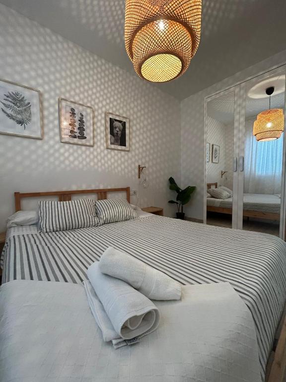 Postel nebo postele na pokoji v ubytování APARTAMENTO PEÑISCOLA