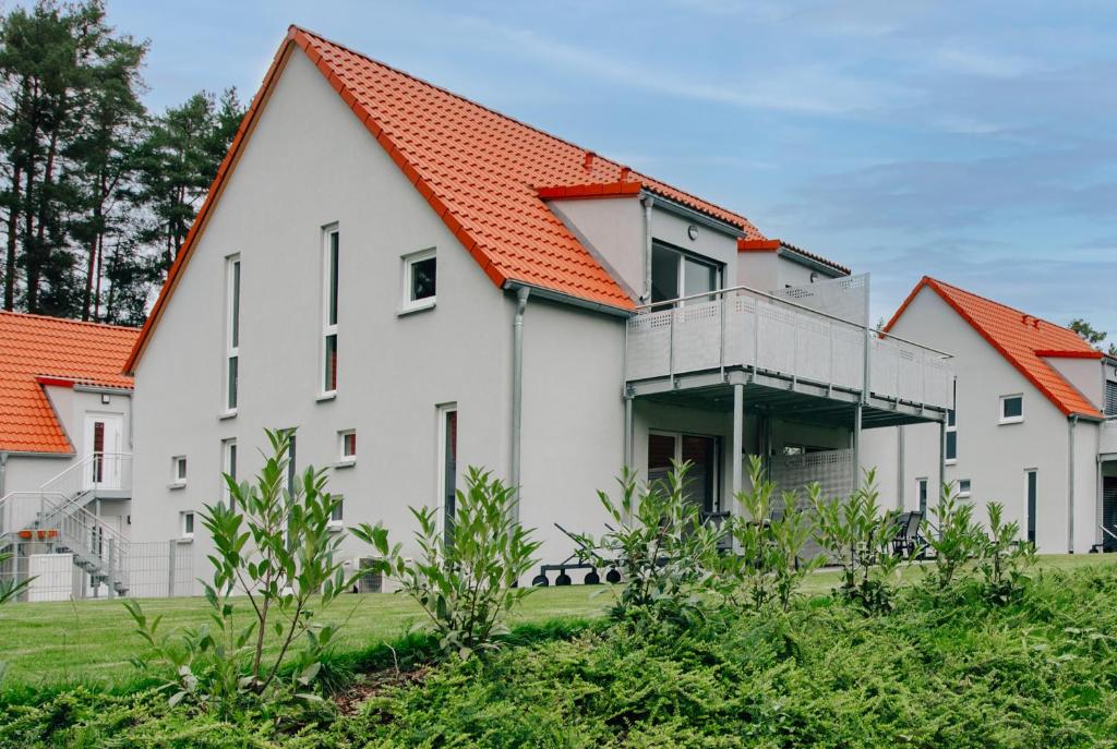 an image of a house with an orange roof at BrombachSeeZeit in Pleinfeld