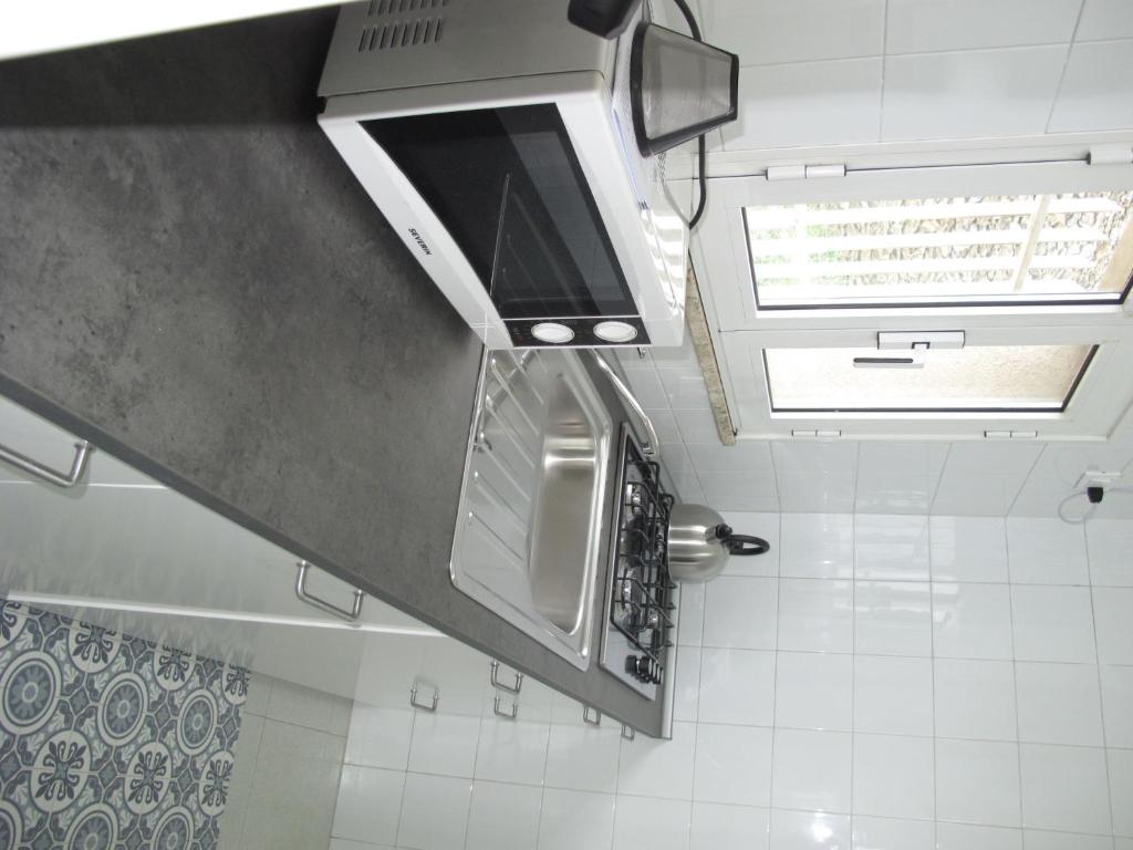 A bathroom at Holiday Home Giorgia - BGB100 by Interhome