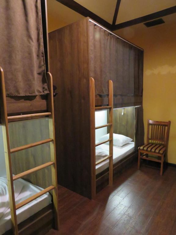 Postel nebo postele na pokoji v ubytování Hostel Jan in the very center