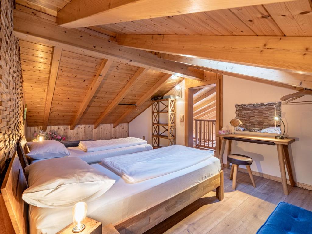 Posteľ alebo postele v izbe v ubytovaní Chalet Chalet Venus by Interhome
