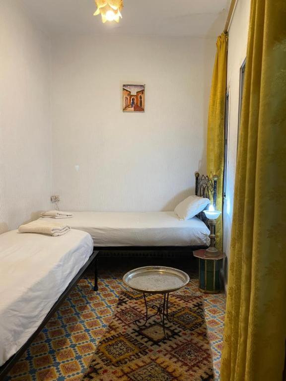 Postel nebo postele na pokoji v ubytování Riad Fez Hostel
