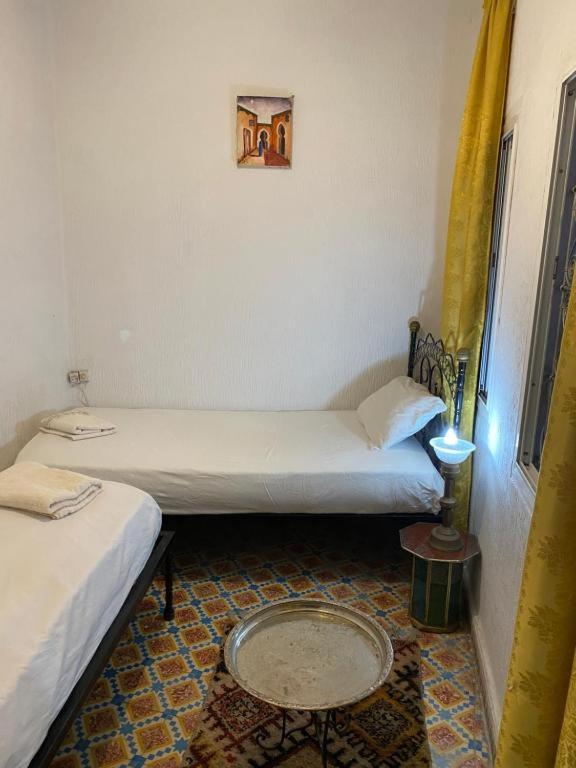Postel nebo postele na pokoji v ubytování Riad Fez Hostel