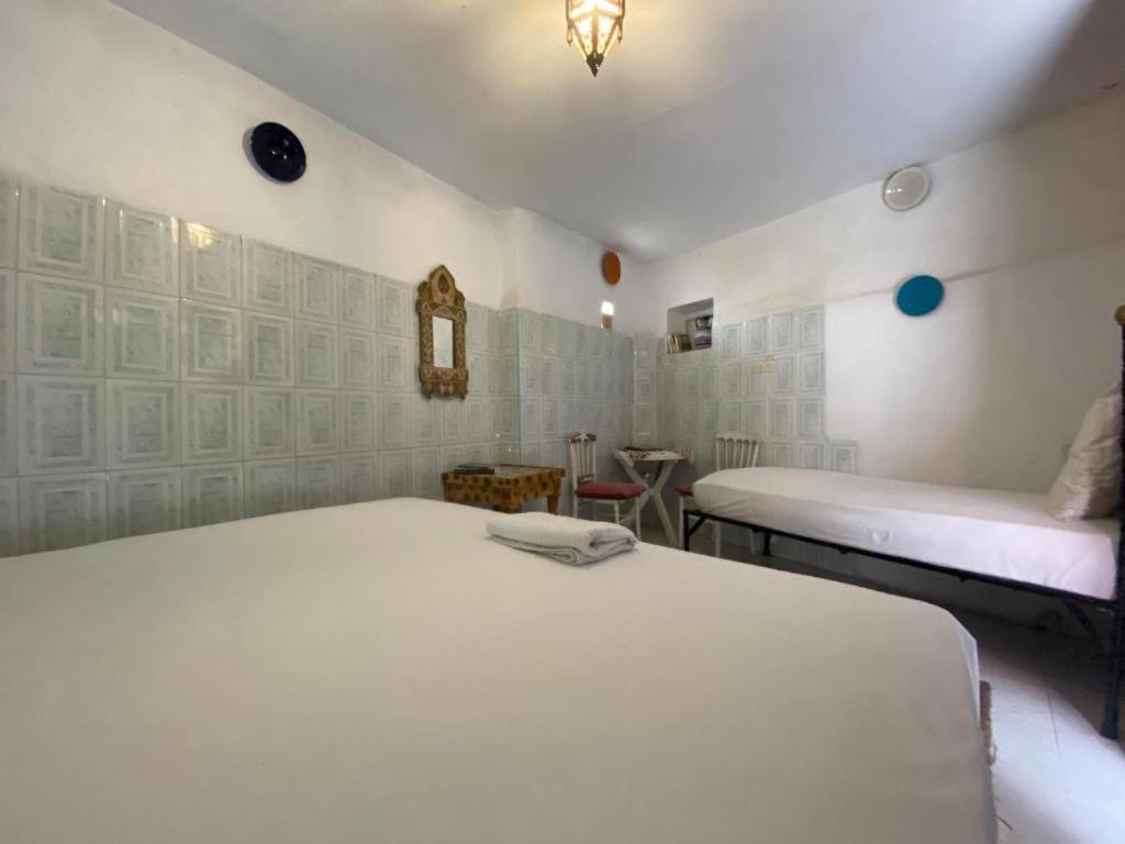 Postel nebo postele na pokoji v ubytování Riad Fez Hostel