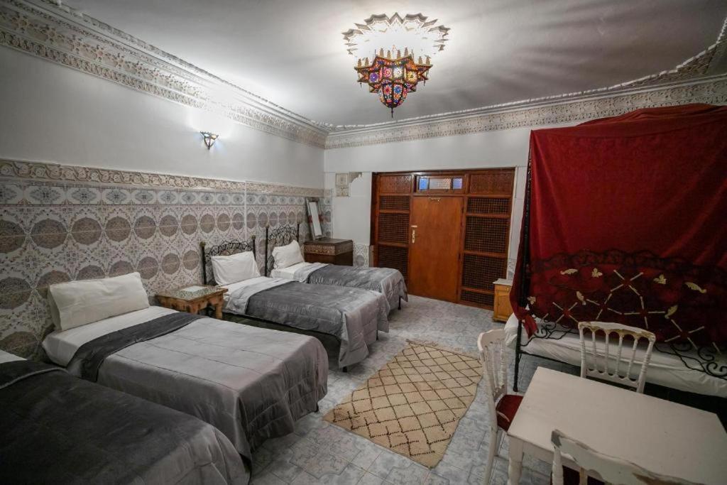 Postel nebo postele na pokoji v ubytování Riad Fez Hostel