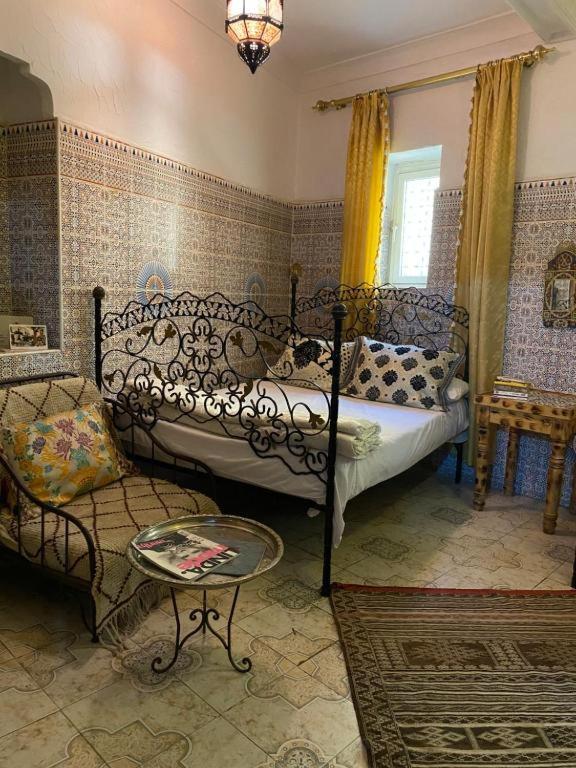 Postel nebo postele na pokoji v ubytování Riad Fez Hostel