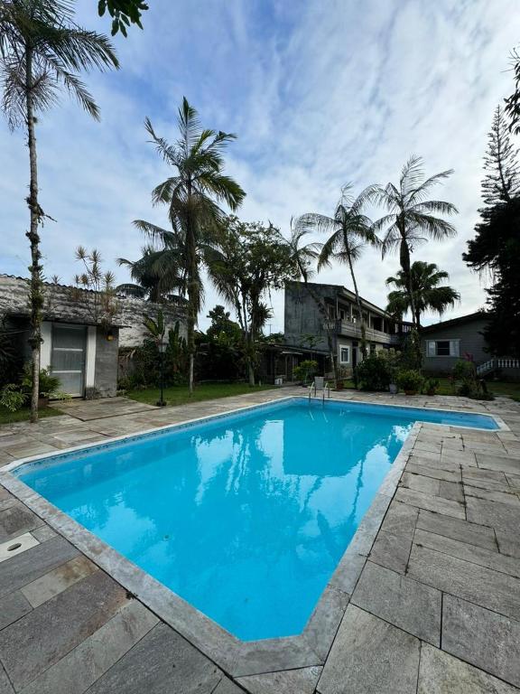 Swimmingpoolen hos eller tæt på Casa 5 quartos com Piscina - Sítio na Praia
