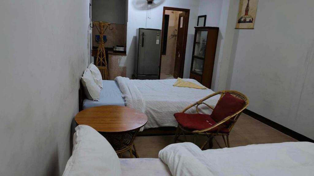 Postel nebo postele na pokoji v ubytování Monkey Temple Homestay