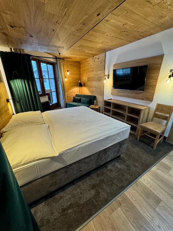 Postel nebo postele na pokoji v ubytování David Wellness Hotel