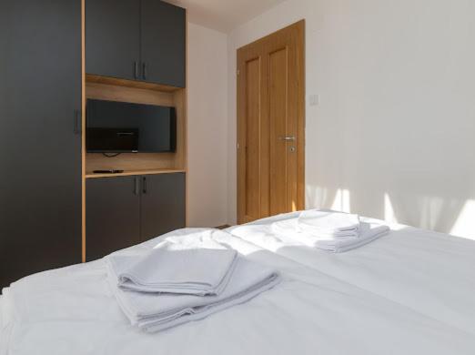 Postel nebo postele na pokoji v ubytování Apartman Vidovic Tara