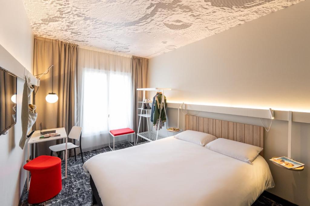 Postel nebo postele na pokoji v ubytování ibis Lyon Centre Perrache