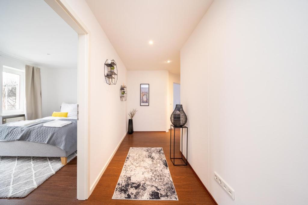 Postel nebo postele na pokoji v ubytování LaDolceVita - 100m2 Apartment in Zentraler Lage