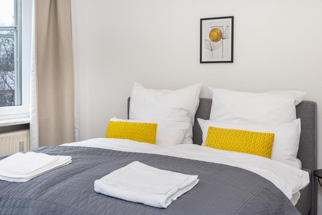 Postel nebo postele na pokoji v ubytování LaDolceVita - 100m2 Apartment in Zentraler Lage