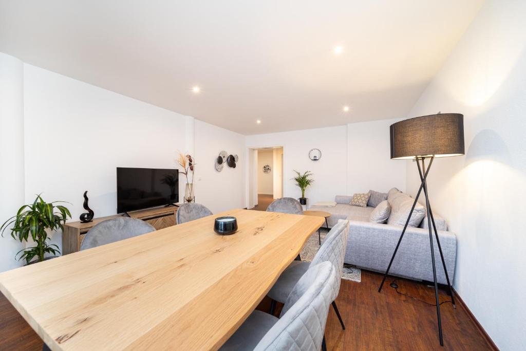 TV a/nebo společenská místnost v ubytování LaDolceVita - 100m2 Apartment in Zentraler Lage